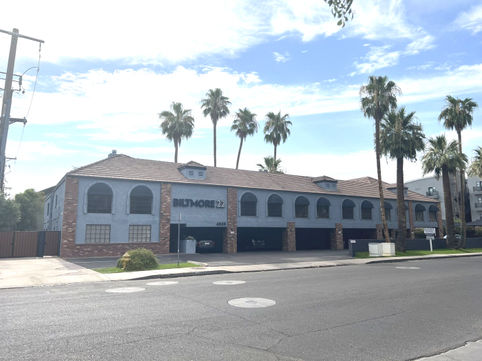 Arizona Statutory Agent building, surrounded by palm trees, in Phoenix, AZ.